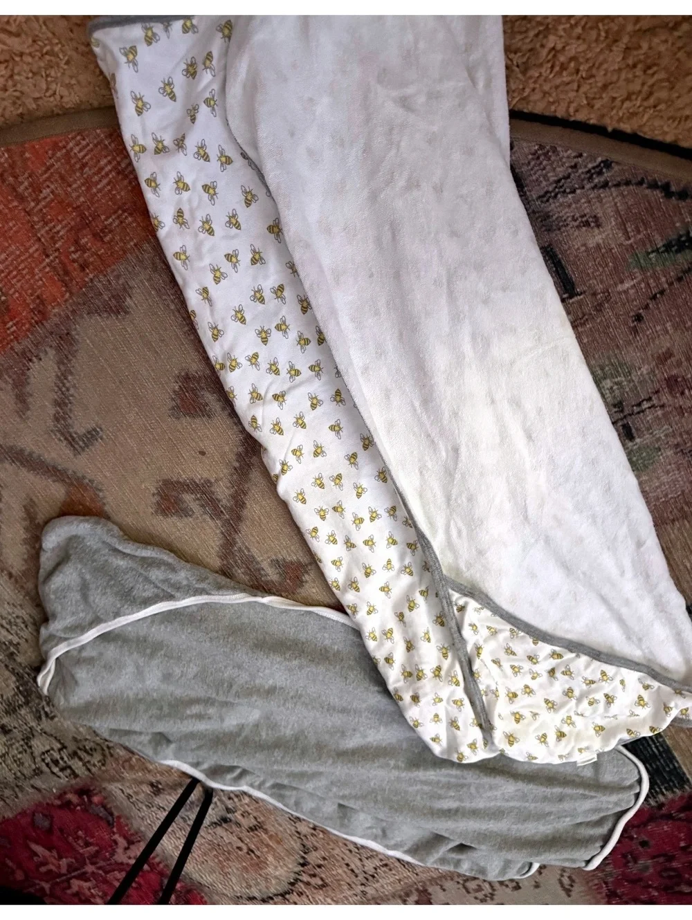 2 towels one gray one with bees ;brand is Burt’s beee